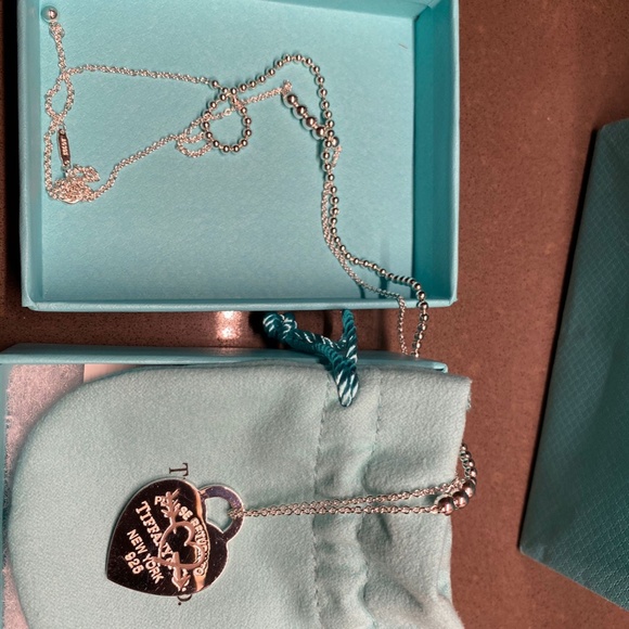 Tiffany & co. RTT heart and arrow necklace.